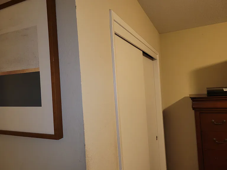 Closet big enough to step inside with alot of storage space.