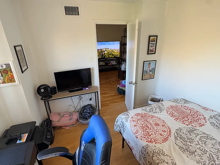 View of the second bedroom/den towards the living room/dining room.
