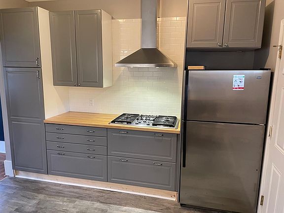 Kitchen, newer stainless appliances.