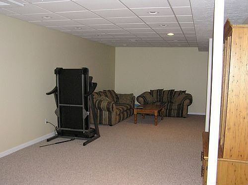 Large finished basement with high ceilings
