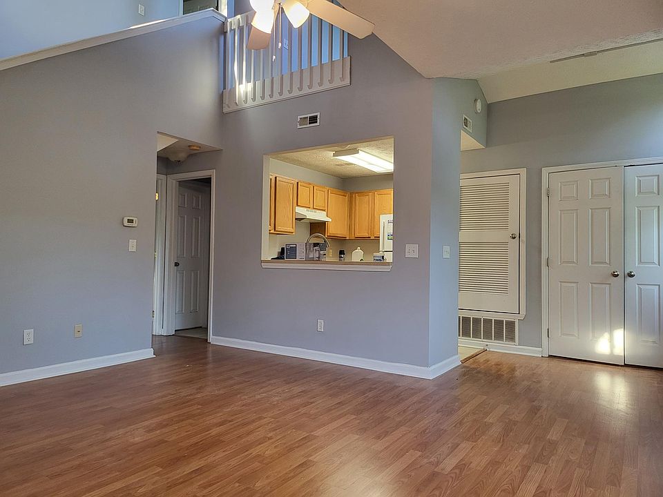 Spacious living Room with new paint, view from the front door