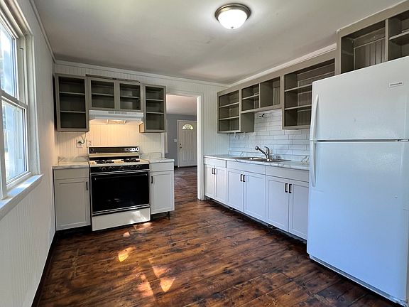 Kitchen with door into living room