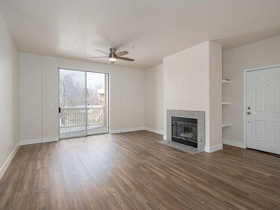 Natural light floods in from the balcony