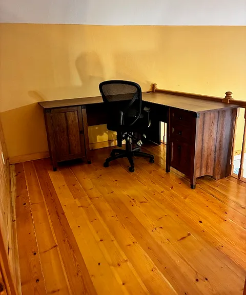 Large loft with office desk and chair