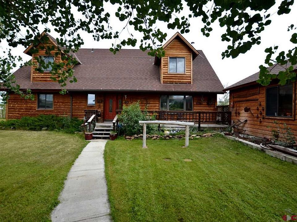 40 Sandpiper Trail in North Elk Meadows, 3 miles from Gunnison. Front of house facing west.