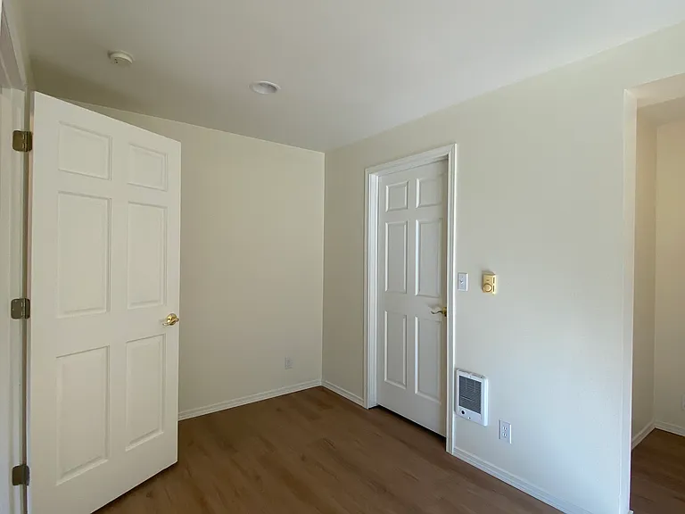 other side of master bedroom, closet door on the right
