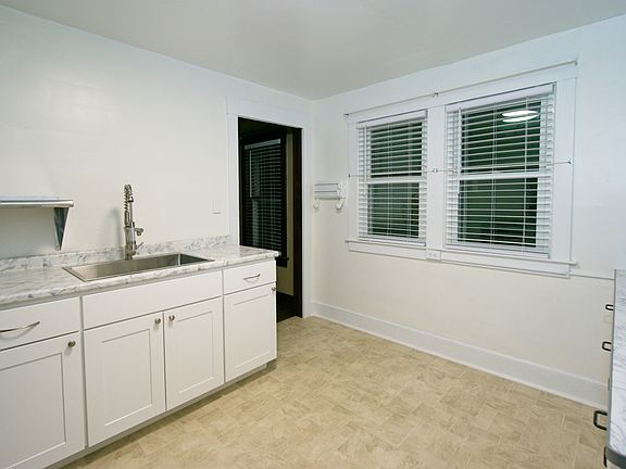 Kitchen viewed from entrance to back porch.