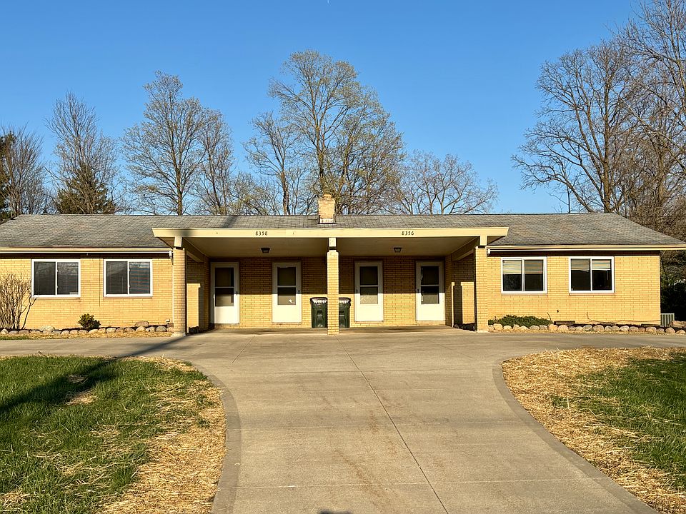 Duplex and the unit is on the left side with parking under the car port and the 2 spots in the front