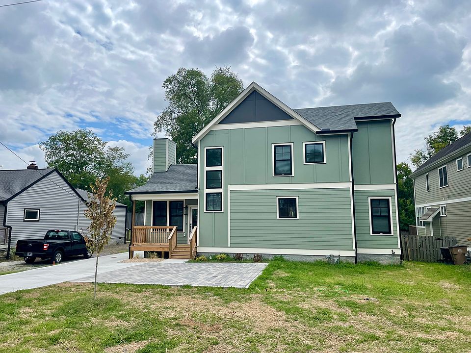 Front of Home with two-car designated parking pad.