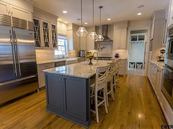 Solid wood cabinets with dove tail construction and soft close doors/drawers. Sound system speakers.