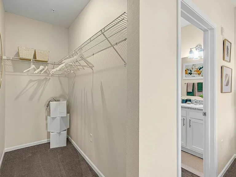 Enjoy the convenience of a spacious walk-in closet and modern bathroom in your student apartment at The Flatts Starkville