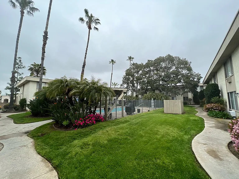 Beautiful landscaping around the swimming pool at IKARIA Apartments in Santee, California.