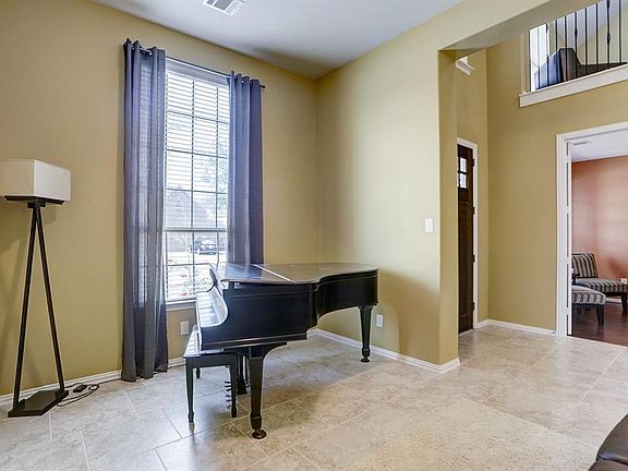 This gorgeous space in the front of the home can be used however you wish! Formal living room, dining room, etc. The options are endless!