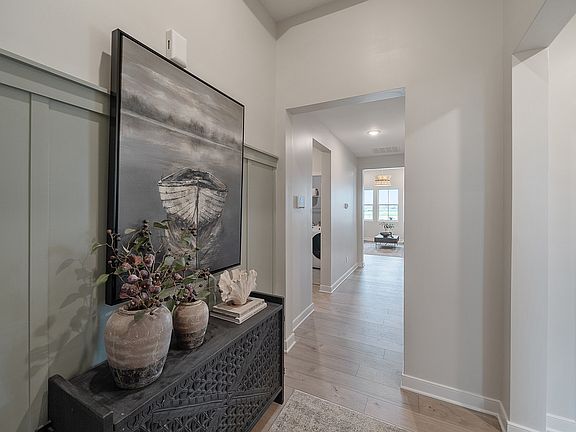 Foyer with entry feature wall and gorgeous flooring