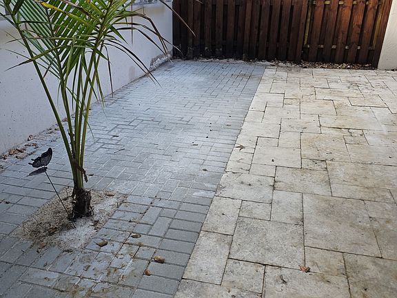 Full Pavers & Travertine clean look. HOA cleans weekly. Maintenance free.