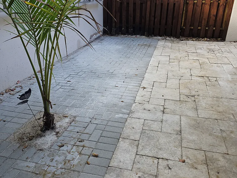 Full Pavers & Travertine clean look. HOA cleans weekly. Maintenance free.