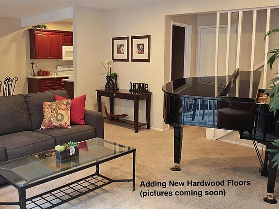 Open concept living room. New hardwood floors being installed