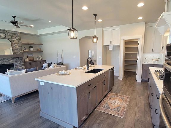 Kitchen and living room *staging items not included*