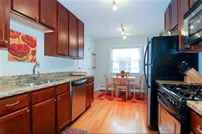 Eat-in kitchen with stainless steel appliances