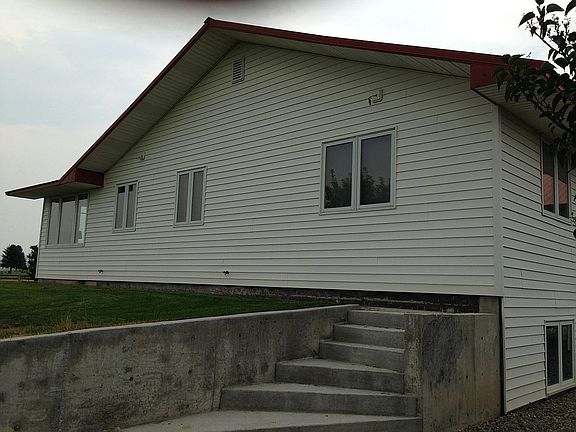 west side of house with step