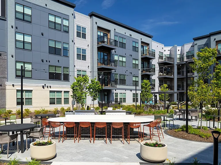 2 Campus courtyard with BBQ grills and ample seating