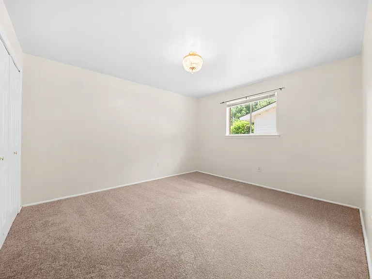 Secondary Bedroom with Carpet