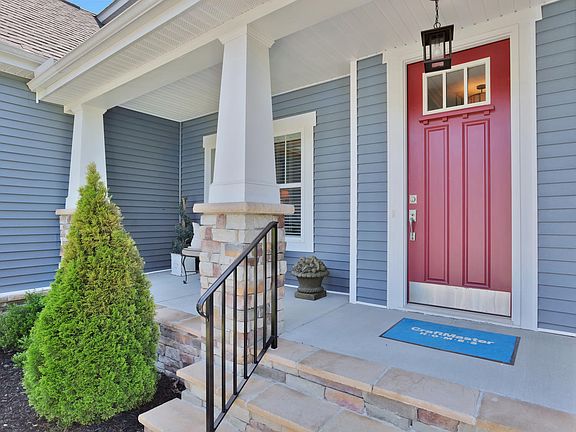 Covered Porch with Metal Roof Accent