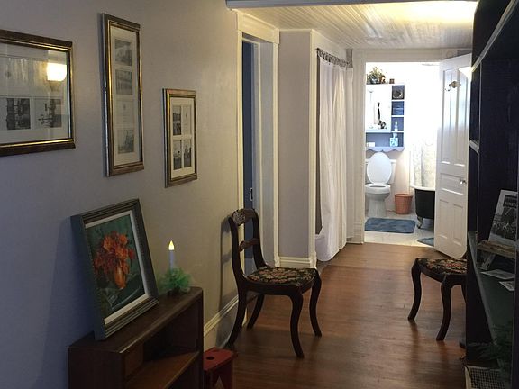 Hallway with built-in shelves