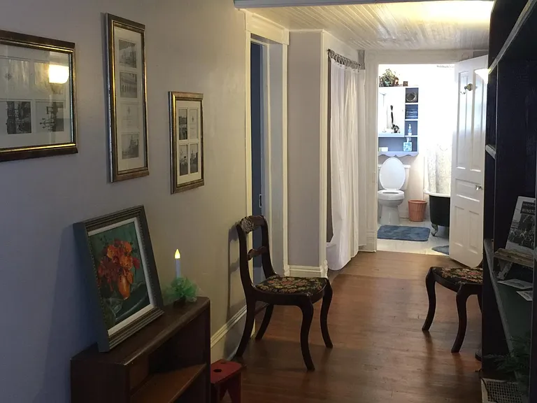 Hallway with built-in shelves