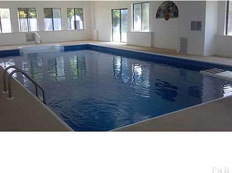 30x57 enclosed pool. Great to use year around