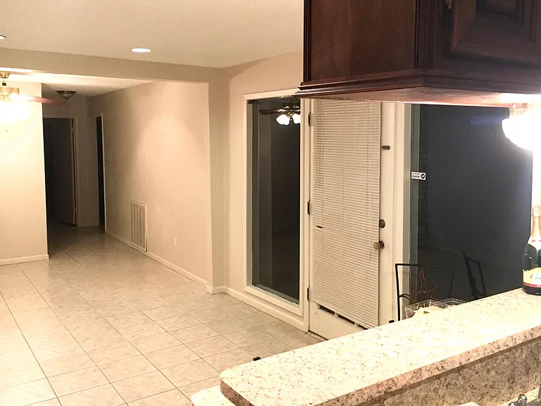Door leading to carport/garage