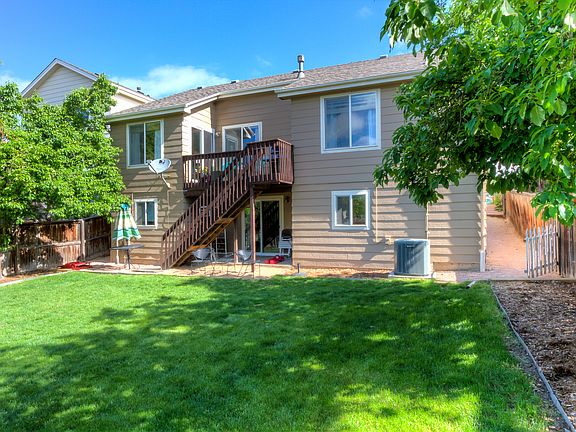 Rear facing south with upper deck.