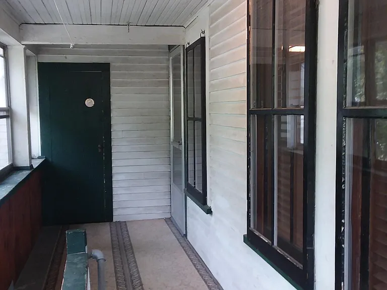 Private 2nd floor entrance, lockable closet, LED ceiling light. Porch faces south, sunny, so quiet and functional!
