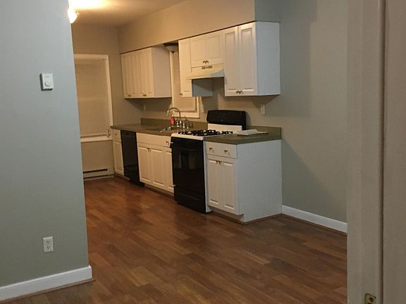 Enter into open concept living room and kitchen.
