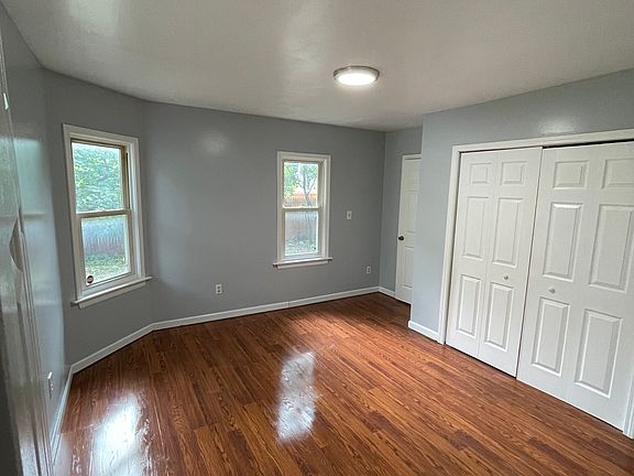 Second bedroom w/ closet different angle