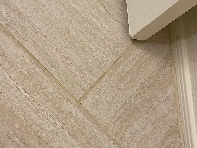 Herringbone Bath Tile in 2nd floor baths