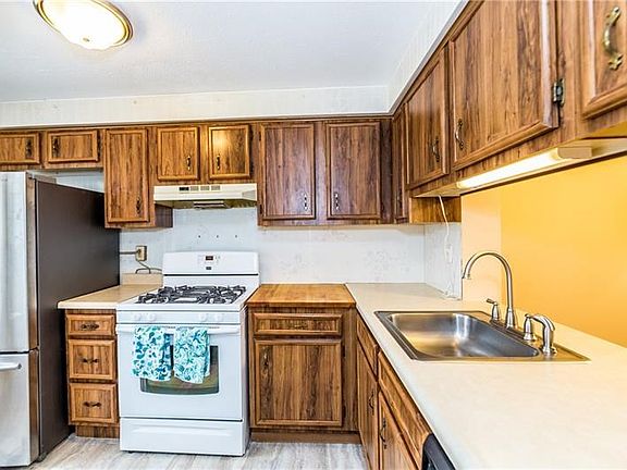 The kitchen has brand new flooring & a ceiling to floor pantry to store all the ingredients you'll need for preparing family mea