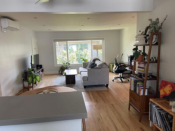 10712 Woodbridge living area original hardwood floor