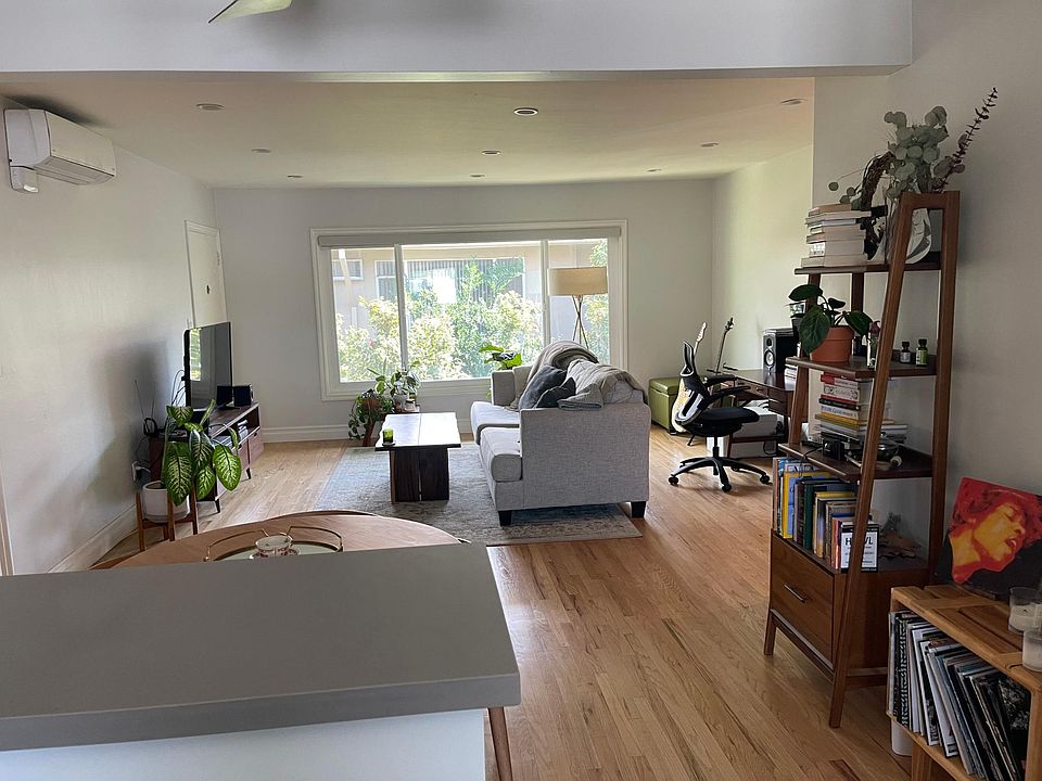 10712 Woodbridge living area original hardwood floor