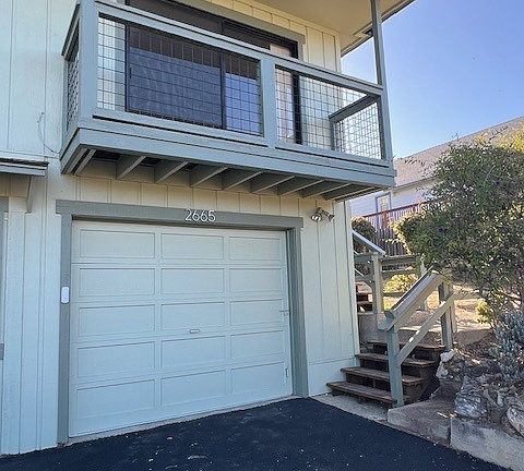Stairs up to the right lead to front door