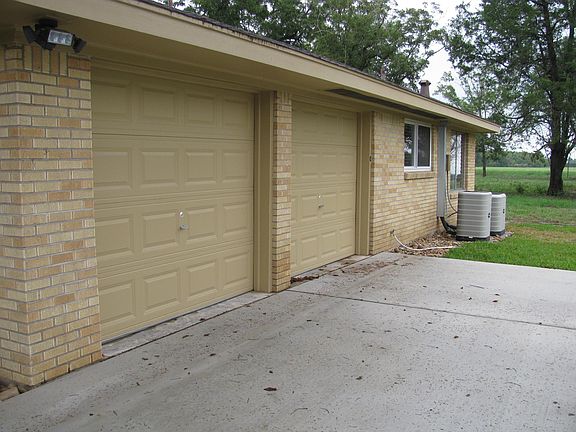 Corner lighting with Motion Detection near Garage Doors