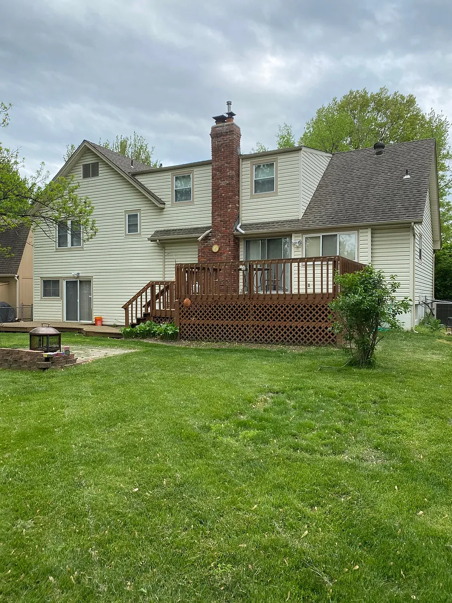 Large Fenced backyard with 2 decks and Fire pit area - 9158 W 92nd Pl