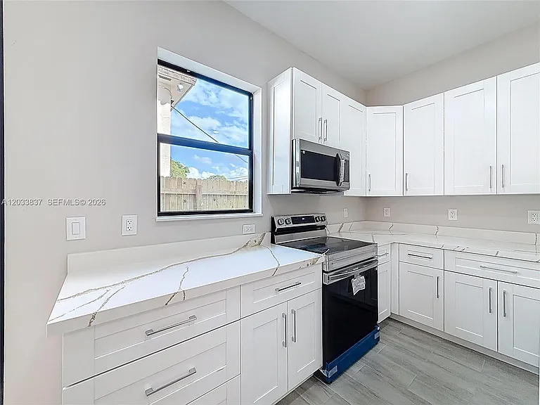 410 NW 41st St #410 — Photo 13