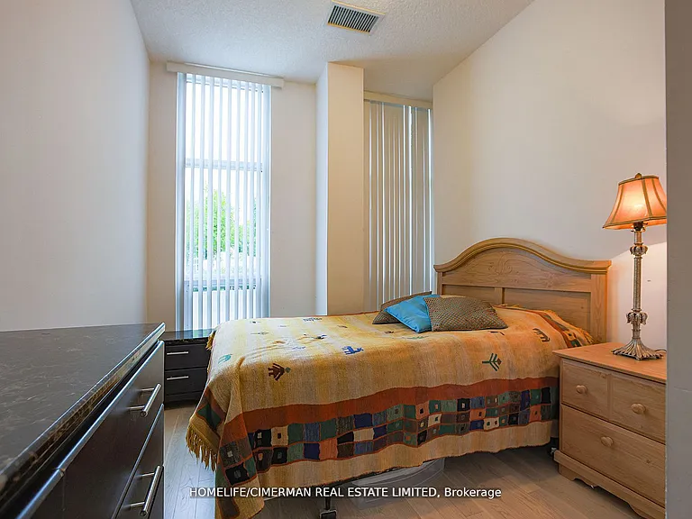 9191 Yonge St #103 — Photo 11