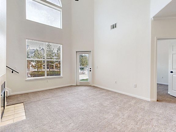 Living room with vaulted ceilings