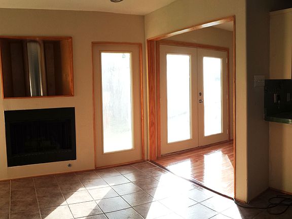 breakfast nook with doors to back yard