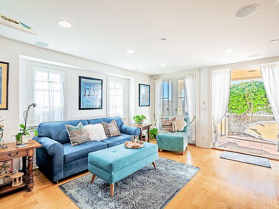 This room opens to the enclosed patio with direct beach access. A 3/4 bath services the floor and has access to the outside shower.