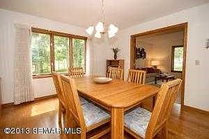 Formal dining room with hardwood floors