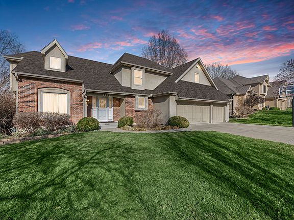 Front! Spacious 3 car attached garage with level driveway. WOW! Finished walk-out basement with 4th bedroom, 3rd full bathroom, living room, bar/kitchen area and a bonus room (office or workout room). Could easily be a mother in-law suite