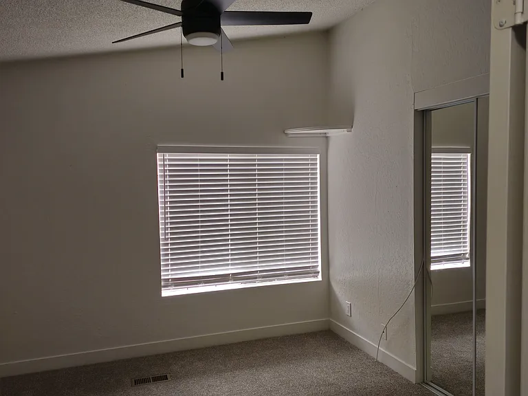Second bedroom- high ceilings!